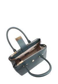 Teal leren handtas met gouden hardware, ritssluiting en dubbele handvaten. Heeft een gladde textuur en een lichtgekleurde binnenvoering.