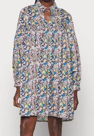 Weit geschnittenes langärmeliges Minikleid mit blauem, gelbem, pinkem und weißem Blumenmuster sowie einem Schlüsselloch-Ausschnitt mit Knoten-Detail.