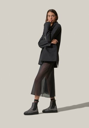 Stivaletti con plateau - grau-schwarz