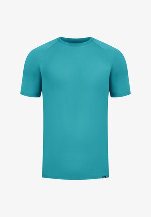 T-shirt a maniche corte color turchese con scollatura rotonda. Realizzato in un tessuto liscio e elasticizzato. Presenta maniche raglan e un taglio dritto.