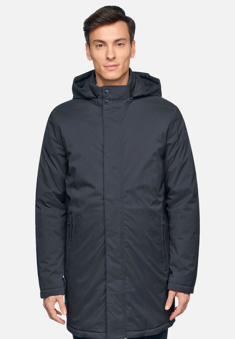 Parka isolante grigio scuro con cappuccio, dotata di chiusura con zip sul davanti, tasche laterali e finitura liscia e opaca. Le maniche lunghe arrivano ai polsi.