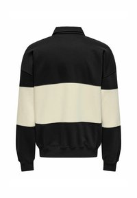 Schwarz- und cremefarbene Color-Block-Trainingsjacke mit erhöhtem Kragen, gerippten Bündchen und Saum. Weicher Stoff mit horizontalen Streifen über den Rücken.