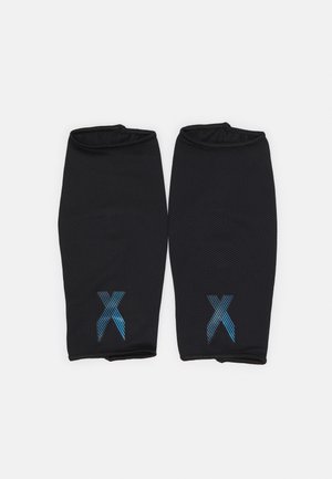 X SG LGE - Espinilleras - black