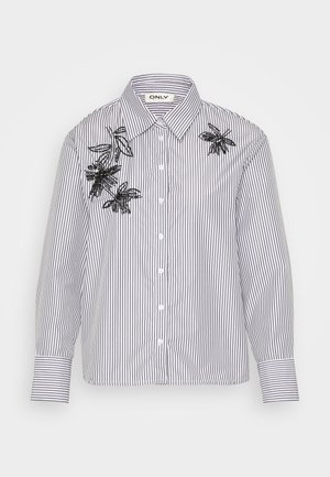 Striped button-up shirt in white and navy. Features black embroidered insect designs on the left side. Classic collar and long sleeves.