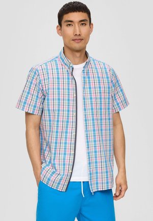 Chemise à manches courtes, à boutons, avec un motif à carreaux multicolore comportant des nuances de bleu, de rose et de vert. Tissu en coton et coupe droite.