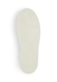 Weiße Gummisohle mit strukturiertem Muster aus Zickzacklinien und Punkten, mit einer leichten Kurve an der Ferse und einem markierten Akzent.