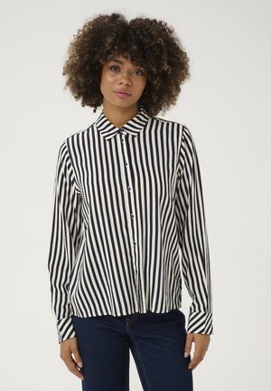 Striped long-sleeve shirt featuring navy and cream vertical stripes, a classic collar, and button closures down the front.