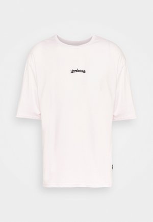 Witte katoen t-shirt met een ronde hals, korte mouwen en geborduurd "unreleased" logo in het zwart in het midden. Zachte textuur.