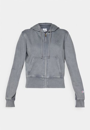 Gray zip-up hoodie made of soft fabric with a ribbed hem and cuffs. Features a drawstring hood and front kangaroo pocket. Logo detail on chest.
