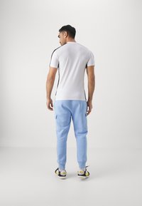 Nike Performance FRANCE FFF CLUB CARGO PANT - National team wear - blue/club gold