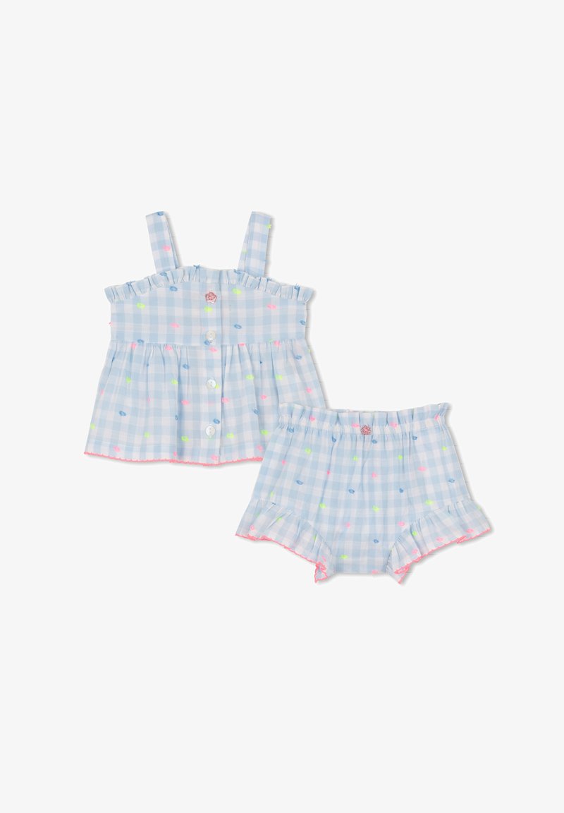 Jasnoniebieski bezrękawnik w kratkę i dopasowane szorty z elastycznym pasem, ozdobione różowymi, niebieskimi i żółtymi haftowanymi kropkami oraz różowymi falistymi brzegami.