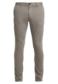 Slim-fit beige chinos med knappstängning, bältesöglor och sidelommer, visade mot en vit bakgrund.