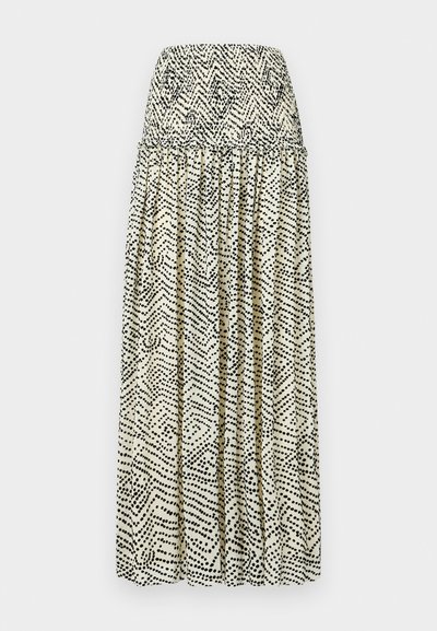 Fustă maxi crem cu un model abstract negru. Dispune de un tiv elastic, un design pliat și o siluetă fluidă.