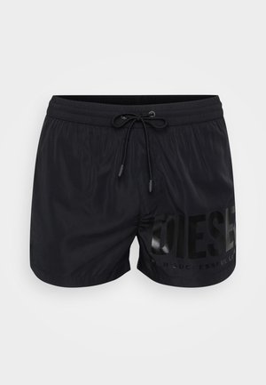 Fekete úszónadrág elasztikus derékkal és húzózsinórral. Jellemzője a fényes "DIESEL" logó és felirat a bal elülső oldalon. Sima textúra.