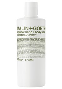 Weiße Flasche mit Bergamot-Hand- und Körperwaschmittel von Malin+Goetz, mit grüner Schrift, einem abgerundeten Deckel und einem eleganten zylindrischen Design. 473 ml Fassungsvermögen.