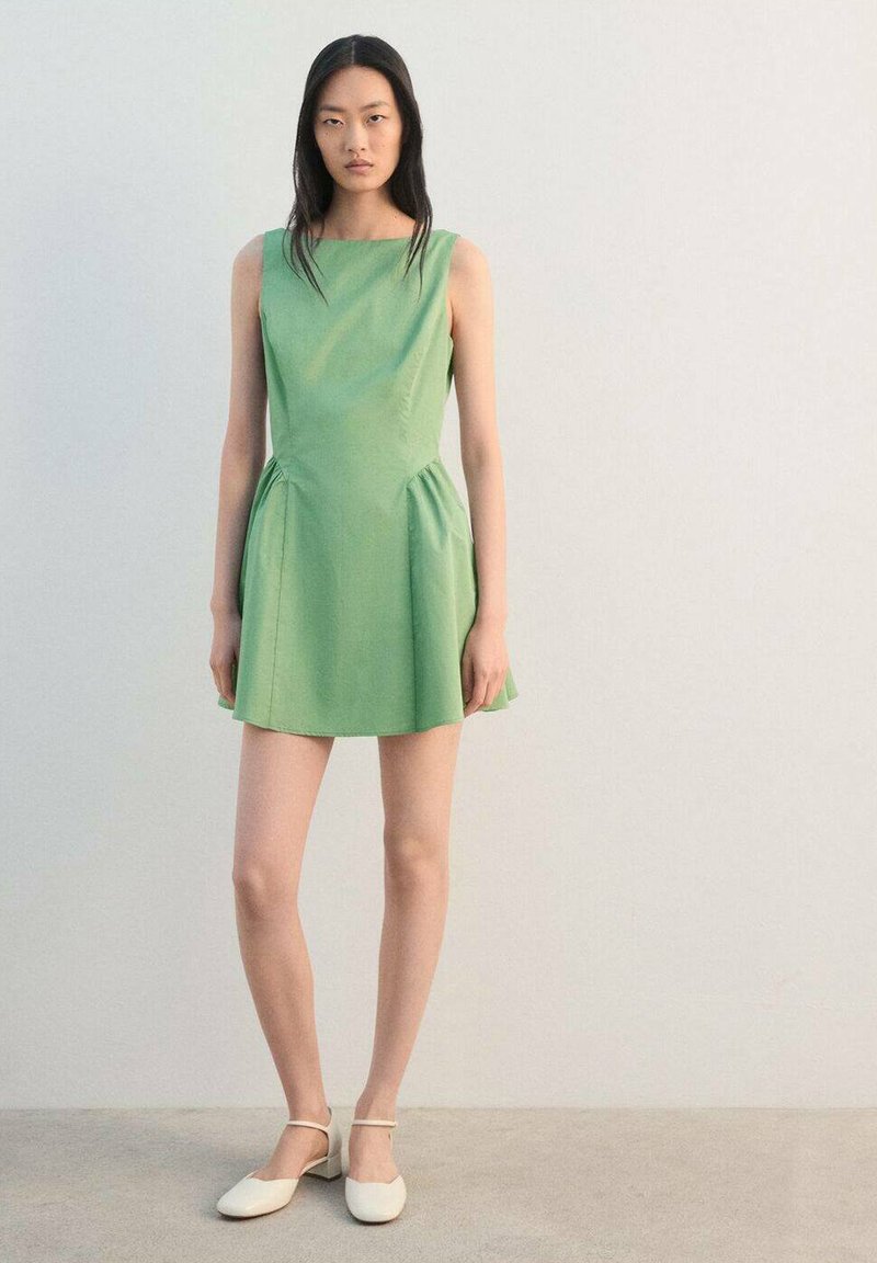 mango green short dress Day - making it perfect for