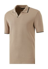 Beige polo särk pehme tekstuuriga, millel on V-kaelus, lühikesed varrukad ja must ääris kaela ning varruka servadel.