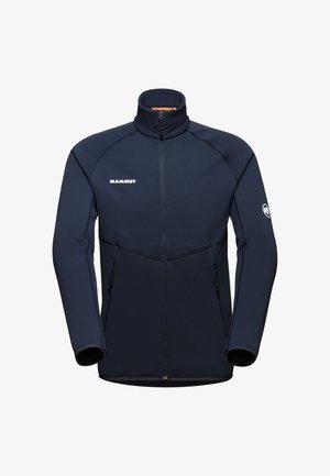 Navy blue fleece jacket with high collar, full zip, and contrast stitching. Features two front zippered pockets and logo on chest and sleeve.