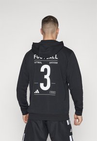 adidas Performance FB CAT GRAPHIC HOODIE - Jersey con capucha - black