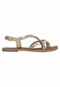 Gouden, metallic strappy sandalen met een platte zool, voorzien van kruislingse en verstelbare enkelbandjes voor ondersteuning en comfort.