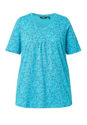 Chemise bleue à manches courtes et col en V avec un motif floral abstrait noir et une coupe ample et décontractée.