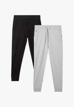 Pantaloni della tuta neri e grigi, con vita elastica, lacci, tasche laterali e caviglie affusolate. Materiale in morbido misto cotone.