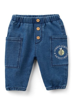 Pantalon bleu pour tout-petit avec taille et poignets élastiques, trois boutons en bois, grandes poches plaquées, et broderie d'abeille avec texte motivant sur la poche droite.