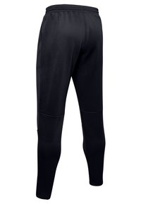 Pantalons de sport noirs avec un tissu lisse et extensible, une coupe fuselée, une taille élastique et des poches latérales pour plus de fonctionnalité.
