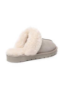 Gray slipper with a soft, cream-colored faux fur lining, cushioned footbed, and textured rubber sole for grip.