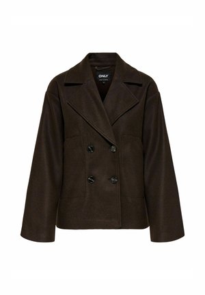 Brun, dubbelknäppt jacka med spetsiga slag, två framfickor och svarta knappar. Mjuk, strukturerad tyg med en fyrkantig silhuett.