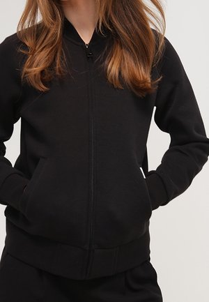 Chaqueta fina - black