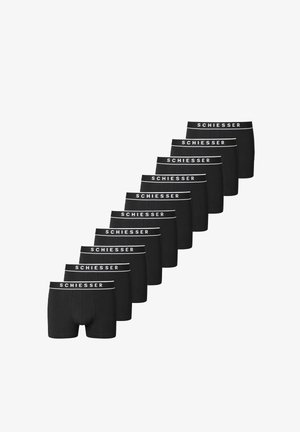 Svarta bomullskalsonger i rad, med ett vitt elastiskt midjeband där "SCHIESSER" står tryckt.