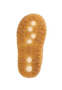 Semelle en caoutchouc avec une texture couleur miel, présentant six motifs circulaires pour l'adhérence et un design de talon plat.