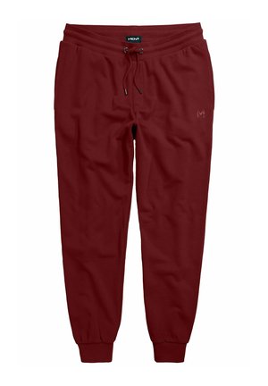 Pantalones jogger de algodón burdeos con cintura ajustable, puños acanalados y un pequeño logo en la parte inferior de la pierna. Textura suave.