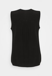 Blusa nera senza maniche con scollatura rotonda e dettaglio plissettato sul retro. Tessuto morbido con una vestibilità leggermente ampia, orlo curvato.