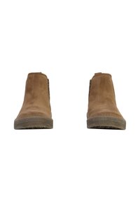 Bottines en suède marron avec un bout arrondi et une semelle en caoutchouc texturée. Aucun matériel ou motif visible ; design épuré et minimaliste.