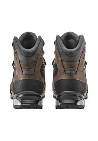 Dunkelbraune Wanderschuhe mit strukturiertem Leder und Obermaterial aus Mesh. Verstärkter Zehen- und Fersenbereich, Schnürsystem und robuste Gummisohle für optimalen Grip.