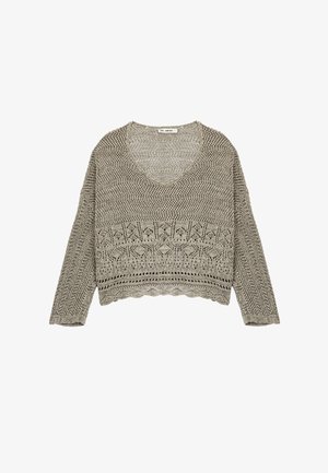 Lichte, gebreide trui in een neutrale tan kleur. Beschikt over een V-hals, lange mouwen en een gegolfde zoom met ingewikkelde kantpatronen.