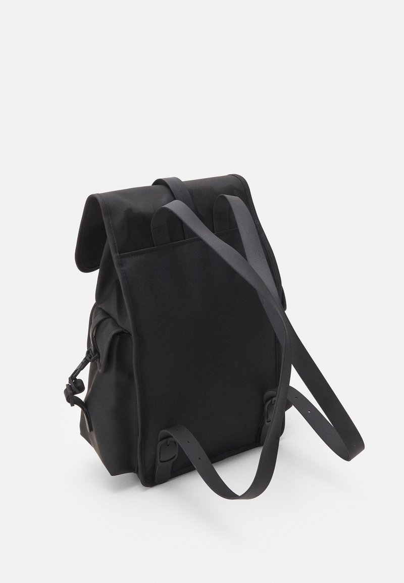 rains buckle-fastening flat backpack Rains Rolltop Rucksack in Black for $150 and functionality with this premium rucksack from the renowned Danish brand Rains Rains Trail Clip Front Backpack