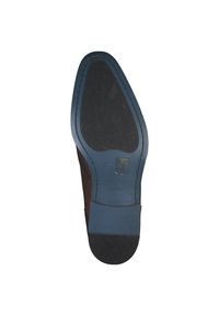 Brown leather shoe sole with a textured black rubber grip, blue accents, and a gold logo. Size 42 marked on the sole.
