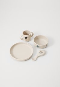 Set of children's dishware in soft beige. Includes a plate, bowl, cup with handles, and spoon. Features animal designs: ostrich, elephant.