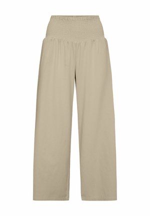 Wide-leg beige pants with high, smocked elastic waistband, loose fit, and smooth fabric.