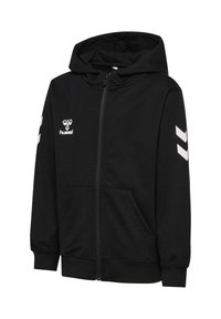 Sort hættetrøje med fuld lynlås med hvid hummel-logo på brystet og Chevron-striber på ærmerne, forlommer og ribstrikkede manchetter.