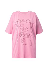 Rosa Baumwoll-T-Shirt mit kurzen Ärmeln, das ein durchgehendes Liniendesign aufweist, das "Be aware" in Verbindung mit Bandmotiven spell.