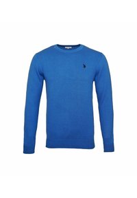 Blå stickad tröja med långa ärmar, rund hals, ribbade manschetter och nederkant. Litet broderat logotyp i svart på bröstet. Mjuk textur.