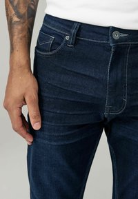 Next MOTION FLEX - Slimfit džínsy - blue dark