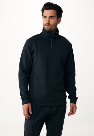 Schwarz, Reißverschluss-Fleece-Sweatshirt mit hohem Kragen, gerippten Bündchen und flachem Saum. Mit glatter Textur und subtilem Stichdetails.