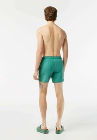 Lacoste Uimashortsit - vert kaki   vert