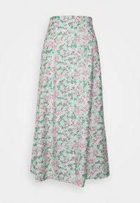 Jupe maxi florale en vert clair avec des fleurs roses et blanches. Fabriquée en tissu doux, elle présente une taille haute et une silhouette fluide.