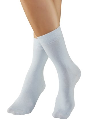 Hellblaue Baumwoll-Socken mit Rippenstruktur, knöchellang und mit glatter Oberfläche an Bund und Zehen.
